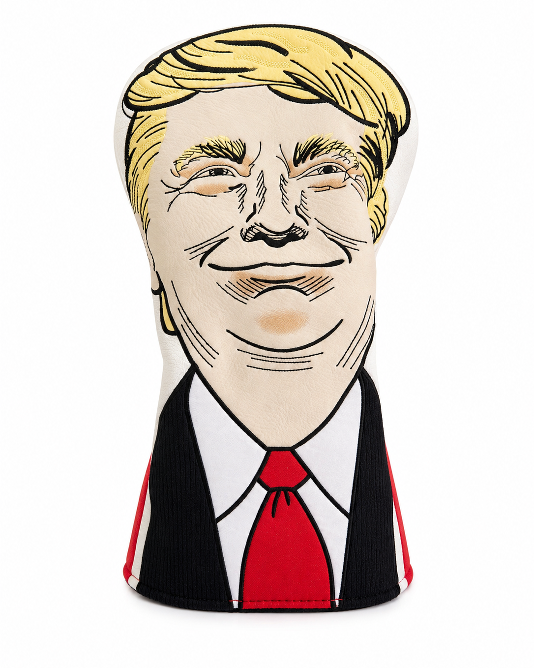 A novelty plush pillow shaped like a caricature portrait of Donald Trump, featuring blond hair, a black suit jacket, white shirt, and red tie on a plain white background.