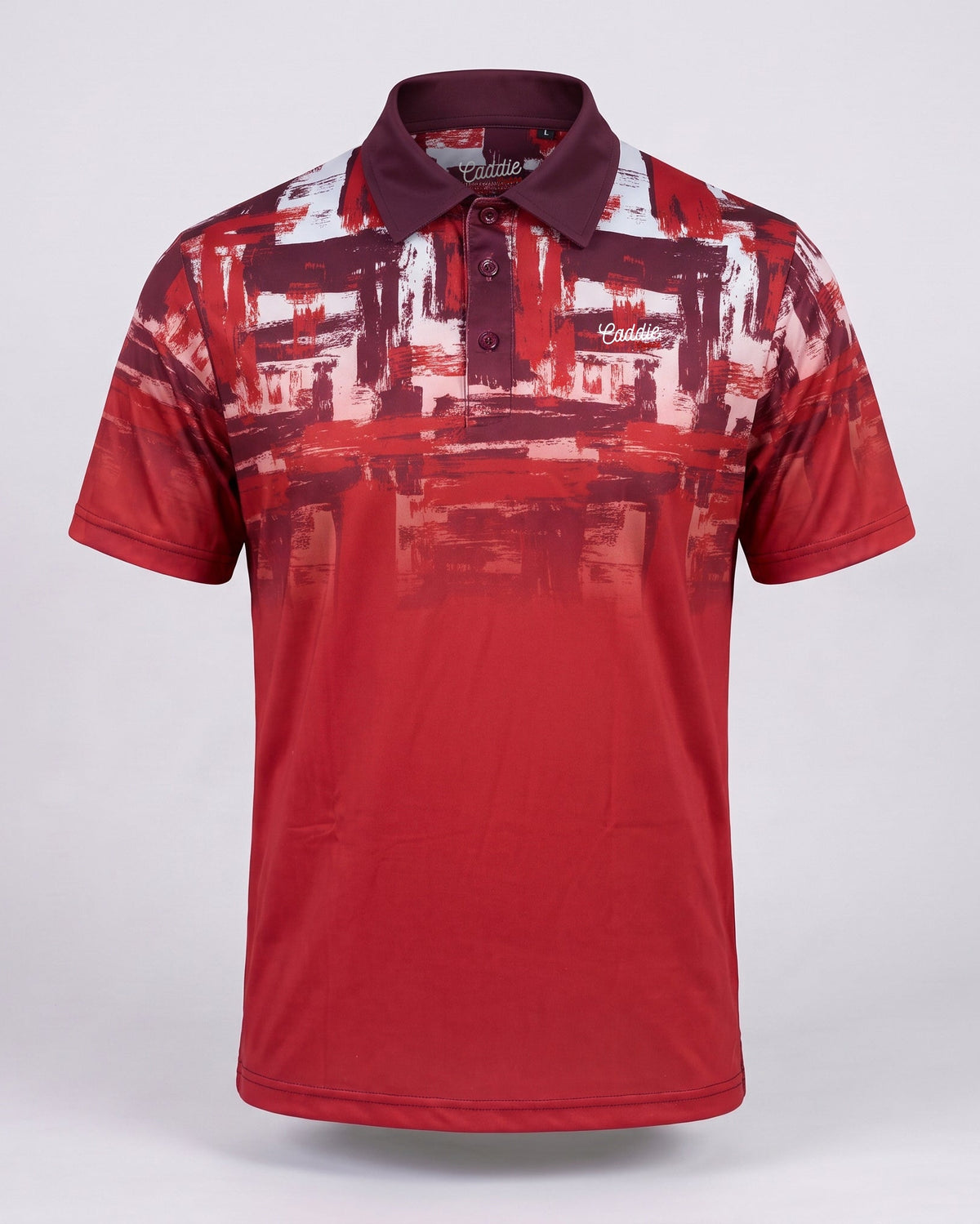 A short-sleeve polo shirt with a red, burgundy, and white abstract brushstroke pattern, displayed on a light gray background.