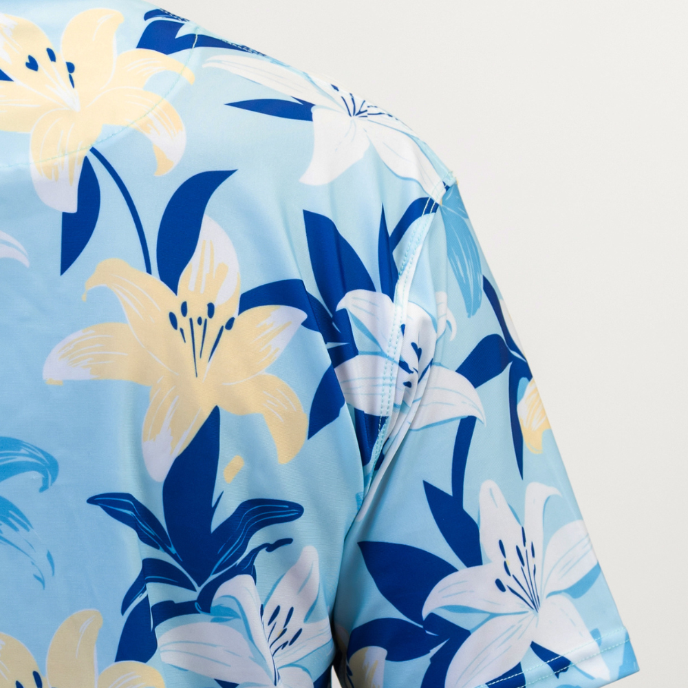 Floral Golf shirt with blue, yellow, and white floral pattern on a light gray background
