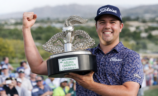 Chris Gotterup holding trophy