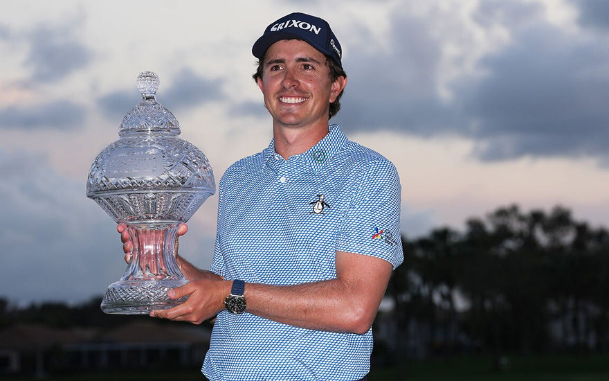 Echavarria holding a trophy