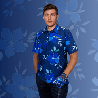 Man wearing Blue Floral Golf Polo. Holding a golf club