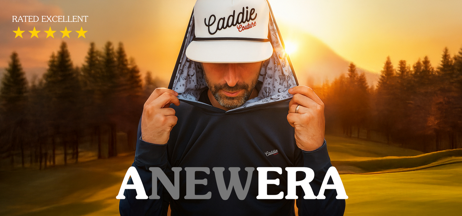 Man holding a hoodie with 'Caddie' text against a golf course backdrop, featuring the brand caddie couture