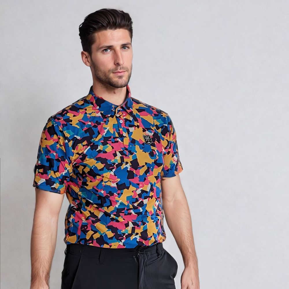 A man wearing a short-sleeved multicolor geometric patterned golf polo shirt.
