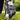 Golf glove and ball on grass with 'Caddie Couture' branding