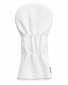 A white golf club headcover with a smooth fabric texture, featuring horizontal stitched compression bands and a small dark tag on the lower right edge, set against a plain white background.