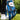 Blue golf glove with white accents on a golf course