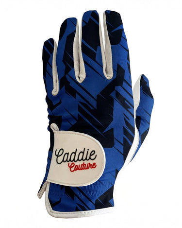 Blue and black patterned glove with 'Caddie Couture' label on a white background