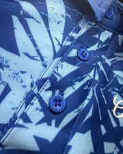 Close-up of a blue and white patterned shirt with buttons