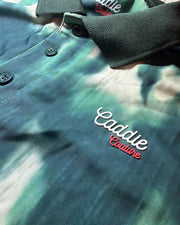 Close-up of a textured surface with 'Caddie' branding.