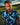 Man wearing a blue patterned shirt on a golf course