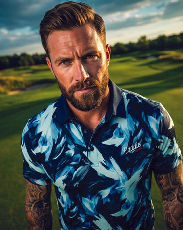 Man wearing a blue patterned shirt on a golf course