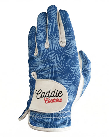 Blue patterned glove with 'Caddie Couture' logo on a white background