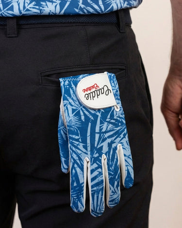 Atlantic Palm golf glove hanging out of a back pocket
