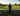 man wearing golf gilet overlooking golf course