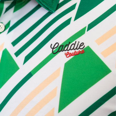 Close-up of a shirt with geometric pattern and 'Caddie Couture' branding.