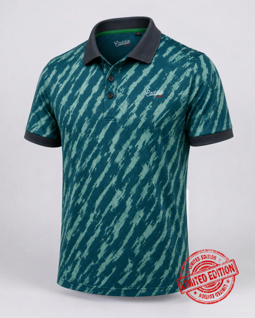 A short-sleeve polo shirt with a teal and green diagonal ikat pattern, featuring a dark collar and sleeve cuffs, and a white embroidered 'Caddie' logo on the chest.