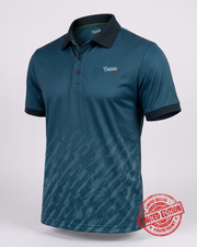A teal and navy blue polo shirt with a subtle diagonal pattern on the lower half, featuring a white embroidered 'Caddie' logo on the left chest. The shirt is displayed on a light gray background with a red 'Limited Edition' stamp overlay in the bottom right corner.