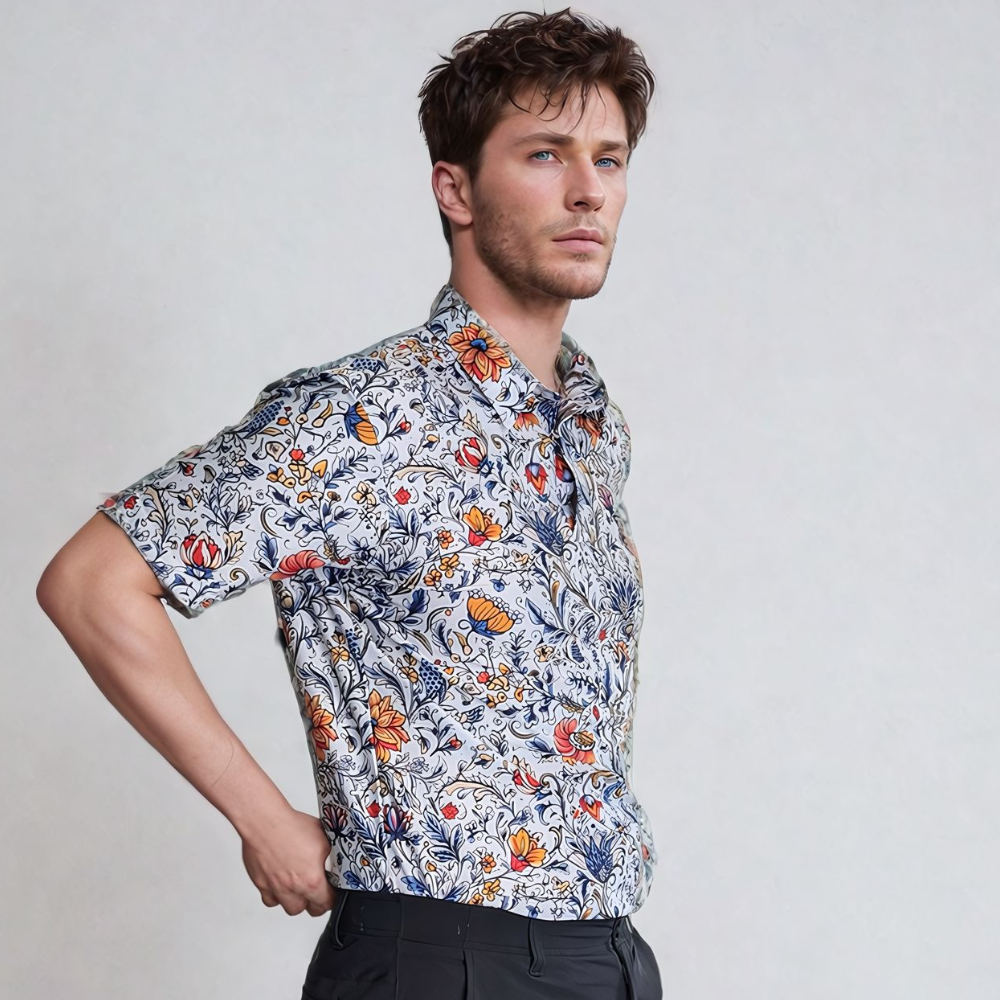 male model side view wearing a vintage floral golf polo shirt