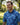 Man wearing a blue patterned shirt in a park setting