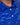 Close-up of a blue patterned golf shirt with white buttons