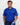 Man wearing a blue patterned golf polo shirt and navy pants, holding a golf club on a white background