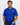 Man wearing a blue patterned golf polo shirt and navy pants, holding a golf club on a white background