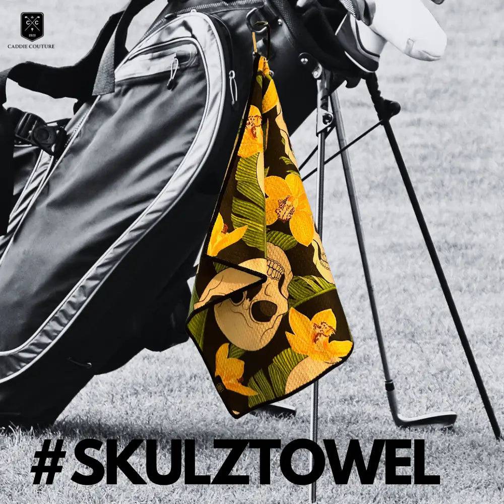 skull golf towel on a golf bag
