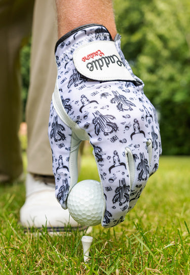 Golf glove with a pattern on a golf course