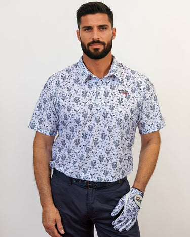 Man wearing a patterned shirt and golf glove on a plain background