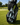 Golf bag with a towel and golf clubs on a golf course
