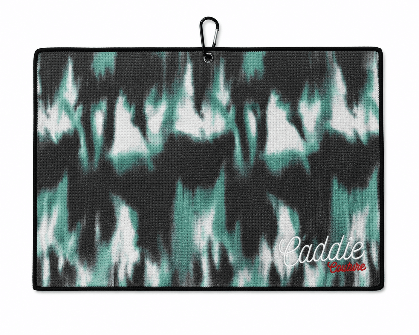 Towel with black and green abstract pattern and 'Caddie Couture' branding.