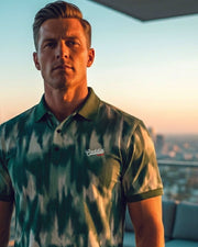 model wearing green camo golf polo on a balcony in a city