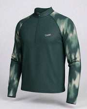 Green long-sleeve shirt with a brand logo on a light gray background