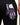 Colorful patterned glove with a brand tag on a black background