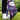 Golf glove with floral pattern on a tee with a golf ball, on a grassy background