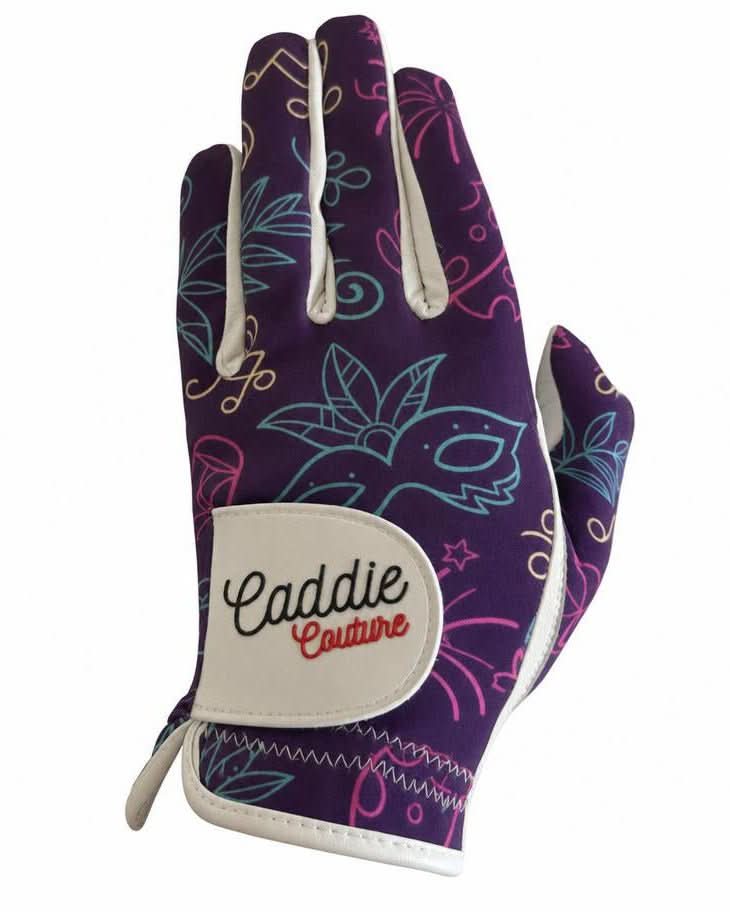 Golf glove with colorful design and 'Caddie Couture' branding on a white background