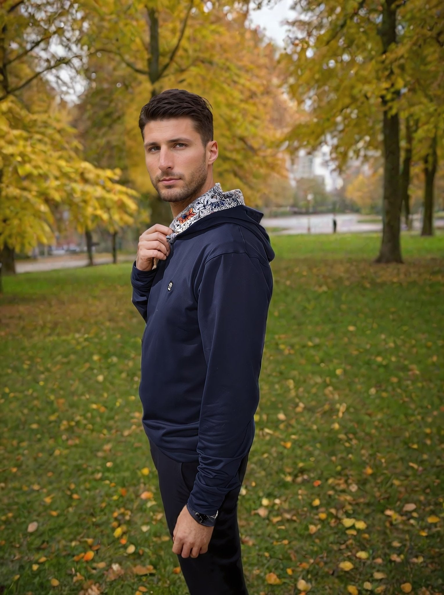 man wearing blue golf hoodie in the park