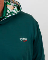 Green hoodie with 'Caddie' logo on a plain background