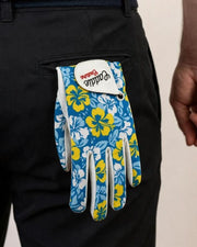 Blue floral-patterned golf glove with a white brand label on a black background