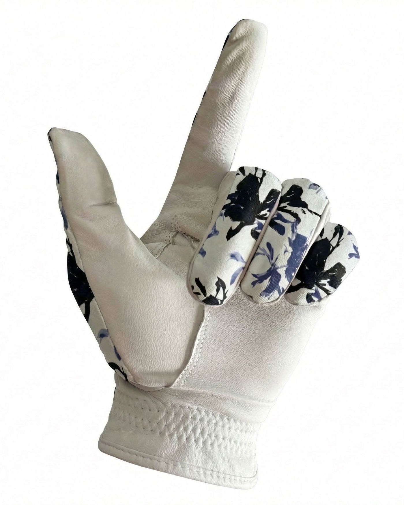 White glove with black floral patterns on a white background