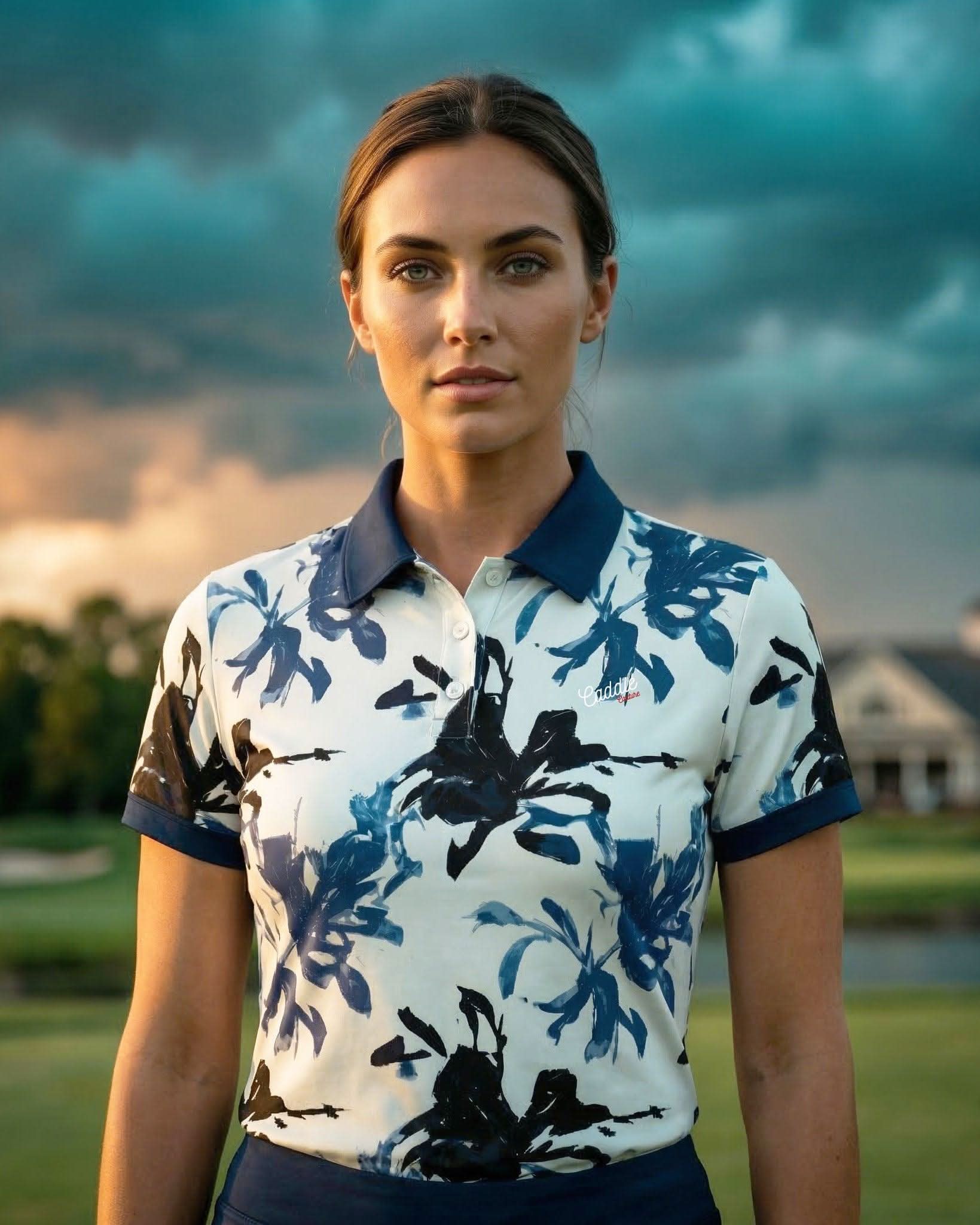 Woman wearing a floral polo shirt on a golf course with a scenic background