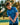 Child in a blue patterned shirt holding a golf club on a golf course