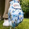Golf glove with floral pattern on a golf course
