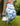 Golf glove with floral pattern on a golf course