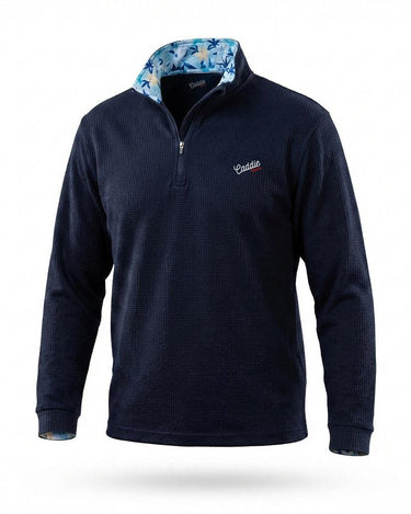 Navy golf pullover with floral collar on a white background