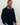 Man wearing golf quarter zip with floral pattern side view
