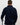 Man wearing golf quarter zip with floral pattern. holding golf club