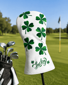 Golf club head cover with green shamrocks and 'Lucky' text on a golf course background