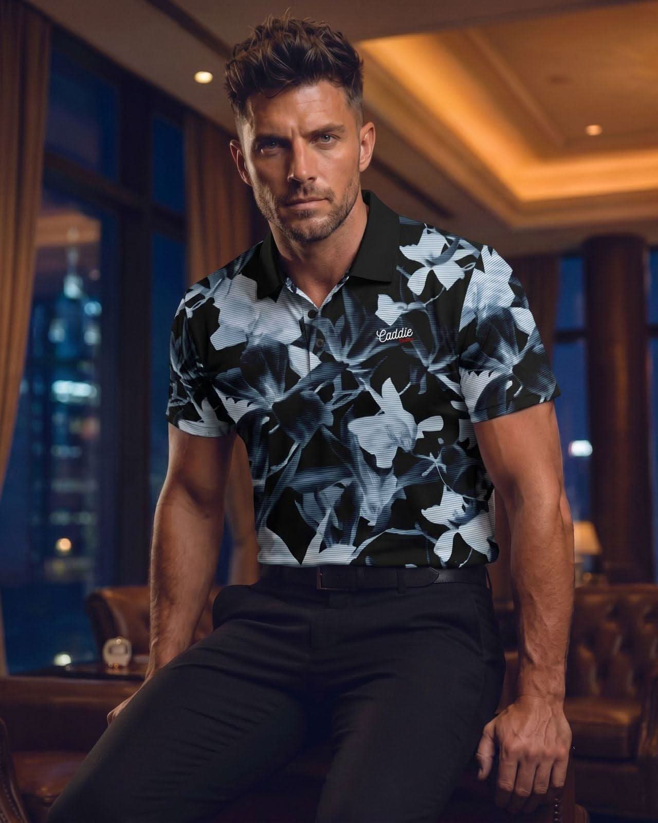 Man wearing a patterned shirt sitting in a luxurious room with city lights in the background